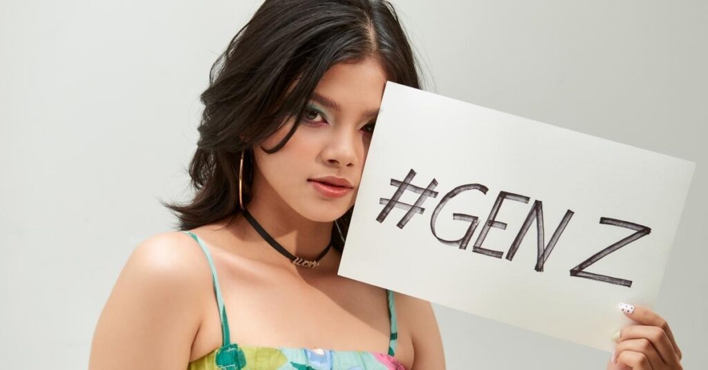 woman holding a card with word, gen z