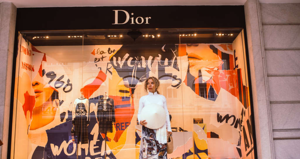 posing in front of dior 