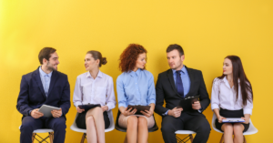 a group of people sitting on the chair